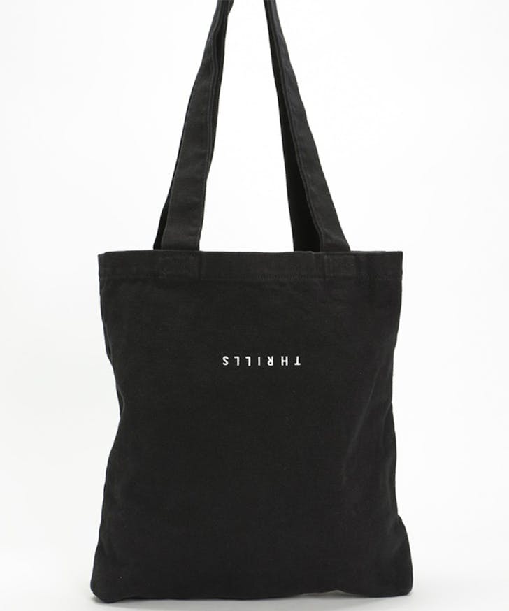 a black cotton tote with Thrills written on it