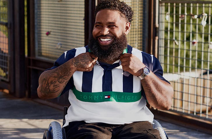man wearing tommy hilfiger in wheelchair