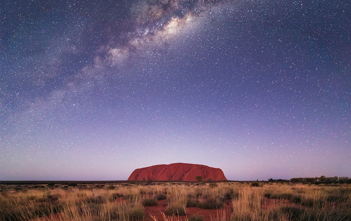 a stunning night at uluru with the milky way sparkling above it