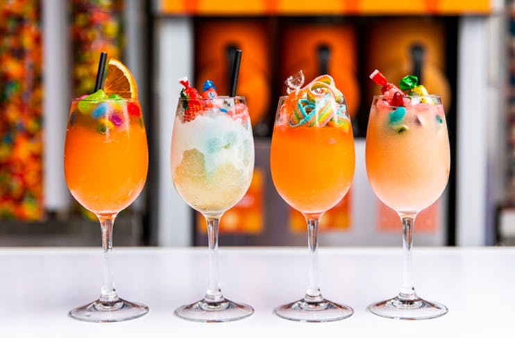 frose drinks lined up on bar top