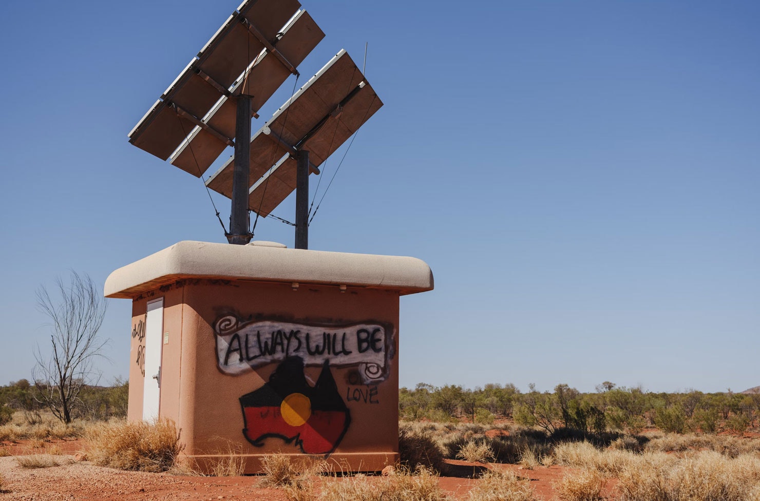 graffiti in the outback reading 