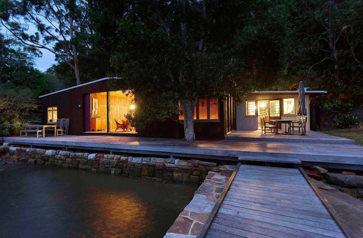 converted seaside warehouse which is now a rustic beach shack
