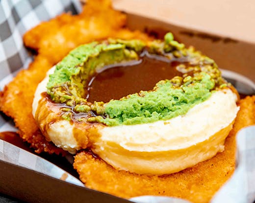 schnitzel pummelled with potato and pea mash with gravy