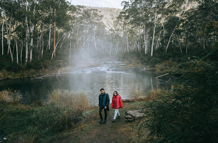 two people walking the the yarangobilly loop in the snowy mountains