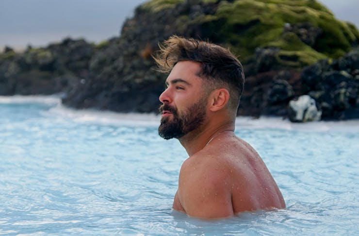 Zac Efron is swims in Iceland's blue lagoon. 